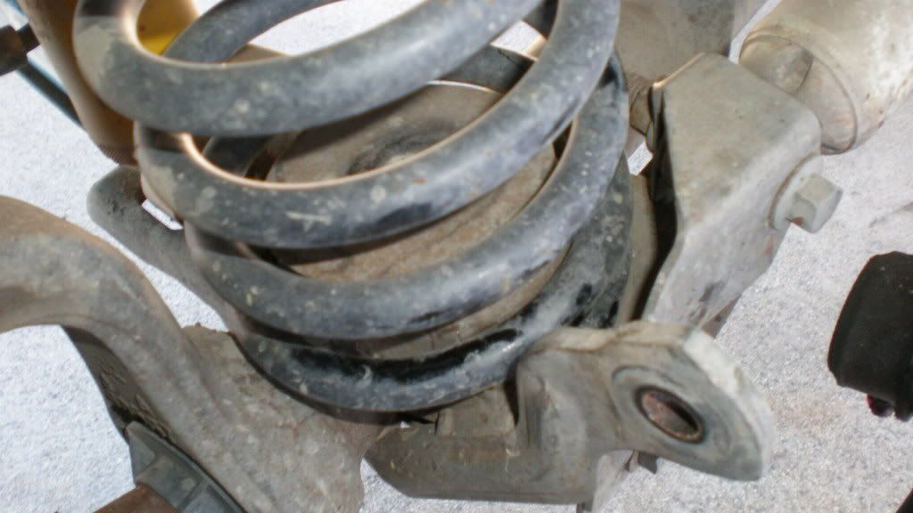 Passengerside front coil spring rubbing frame? Pirate 4x4